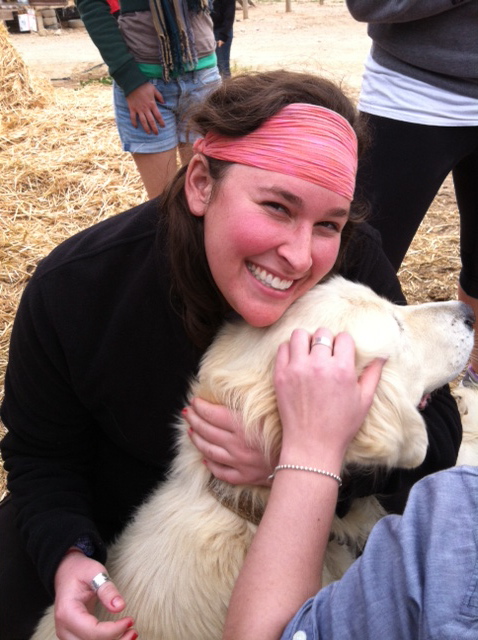 Me trying to get a lab puppy to give me some love. There were about 10 of these beautiful labs roaming the farm!