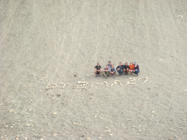 Some of my OTZMA friends making us some free advertising on the side of a hill during our hike.